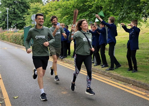 Relay Runners Pass Baton at NA to Raise Awareness of Climate Change