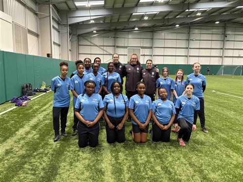 Students receive coaching from Red Roses players at the Northampton Saints Rugby Festival